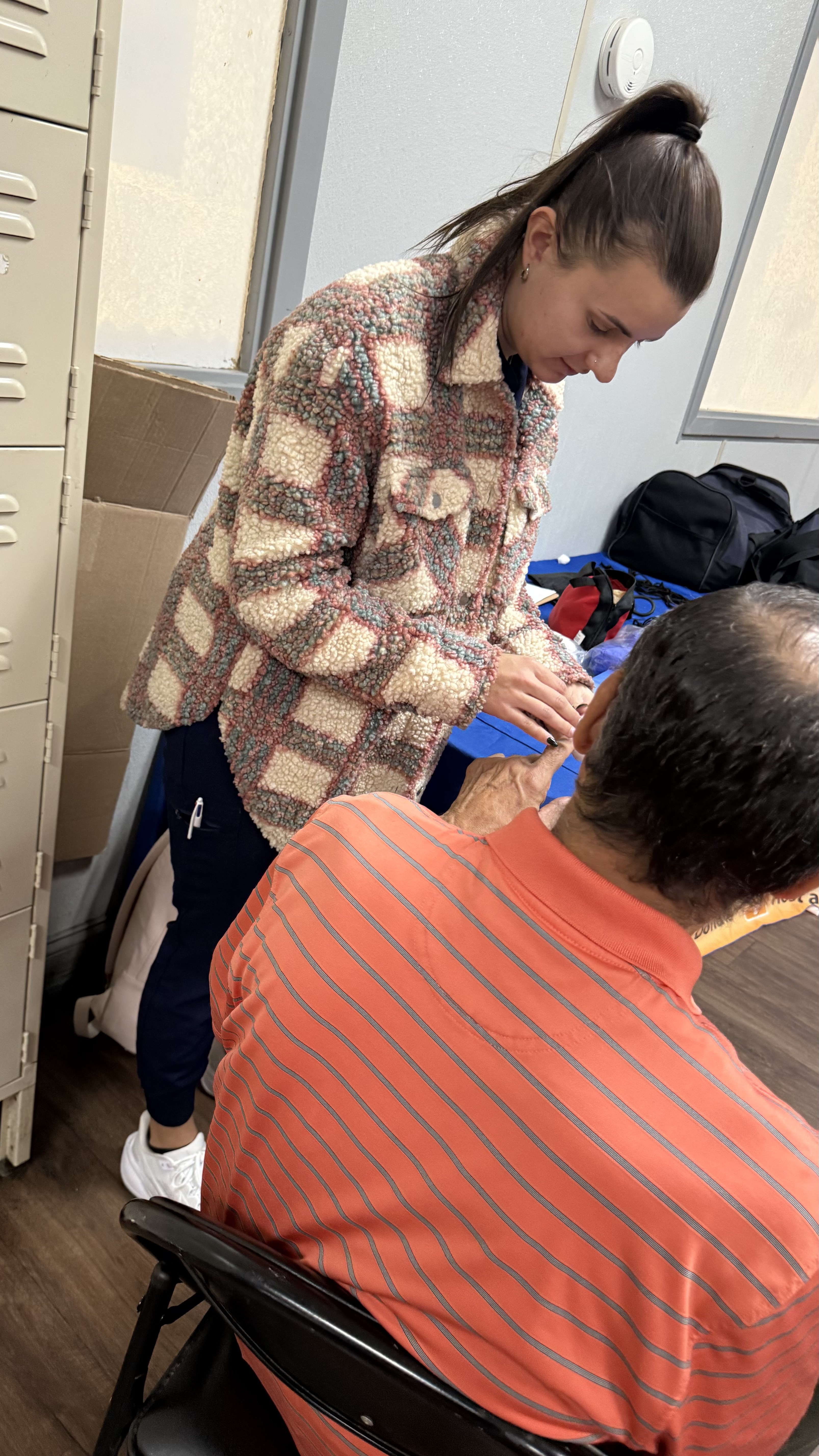 KBB Winter Outreach 2025 — volunteers with community members